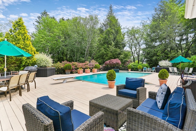8 Hedgerow Cmn, Weston, CT 06883 - swimming pool with outdoor dining space, a deck, outdoor lounge area, and a diving board
