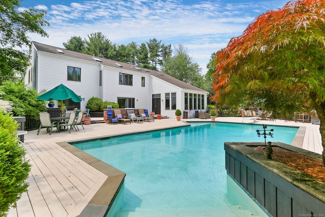 8 Hedgerow Cmn, Weston, CT 06883 - outdoor pool with an outdoor hangout area