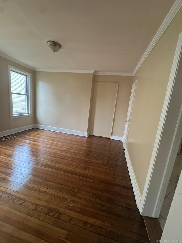 49 Dover St, Bridgeport, CT 06610 - unfurnished room featuring crown molding and wood-type flooring