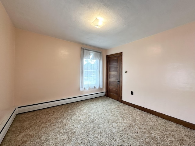 189 N Main St, Griswold, CT 06351 - unfurnished room featuring carpet floors, baseboards, and a baseboard radiator