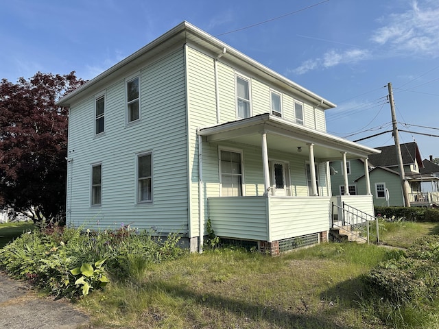 189 N Main St, Griswold, CT 06351 - view of side of property featuring covered porch