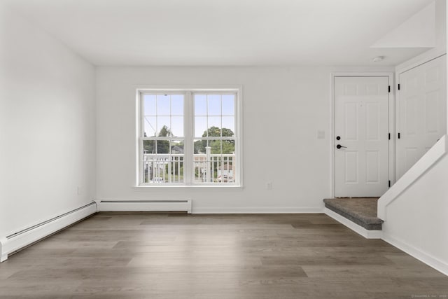 59 Colony St, Bristol, CT 06010 - foyer entrance with baseboard heating and wood finished floors