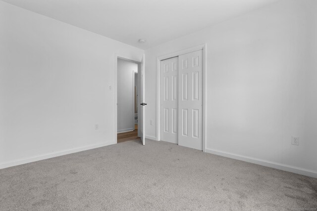59 Colony St, Bristol, CT 06010 - unfurnished bedroom with carpet floors and a closet