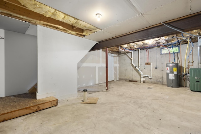 59 Colony St, Bristol, CT 06010 - unfinished basement with water heater and a heating unit
