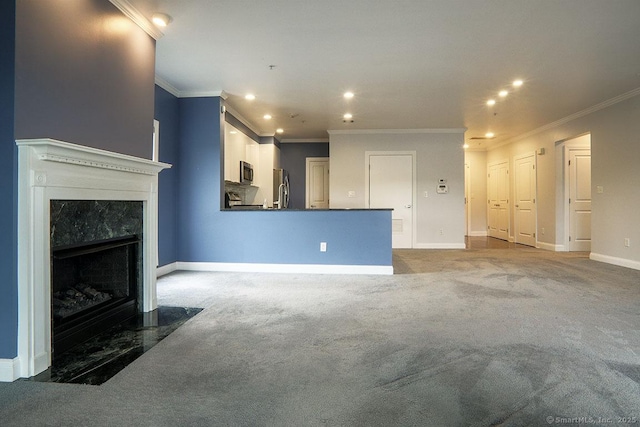 4 Daskams Ln Unit 303, Norwalk, CT 06851 - unfurnished living room featuring ornamental molding, recessed lighting, carpet flooring, and a high end fireplace