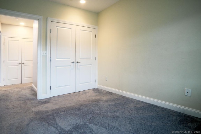 4 Daskams Ln Unit 303, Norwalk, CT 06851 - unfurnished bedroom featuring carpet, a closet, and recessed lighting