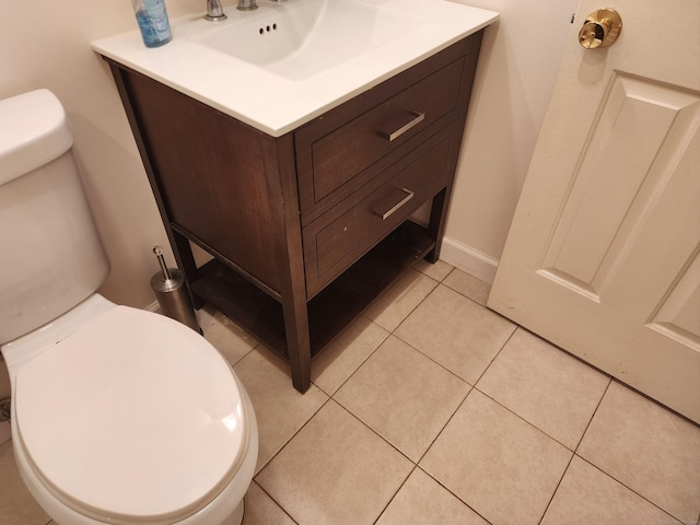 2415 Shepard Ave Apt 30, Hamden, CT 06518 - half bathroom with toilet, vanity, tile patterned flooring, and baseboards