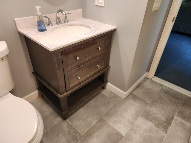 2415 Shepard Ave Apt 30, Hamden, CT 06518 - half bathroom featuring toilet, vanity, and baseboards