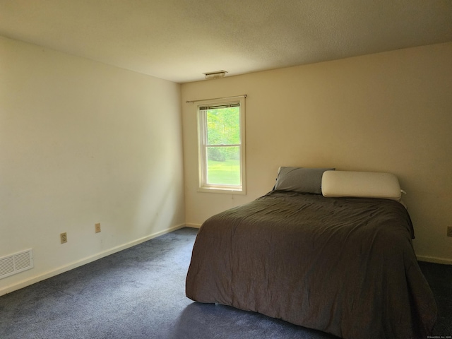 2415 Shepard Ave Apt 30, Hamden, CT 06518 - bedroom with dark carpet and baseboards