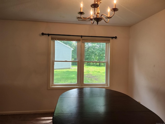 2415 Shepard Ave Apt 30, Hamden, CT 06518 - dining area with a chandelier, carpet floors, and baseboards