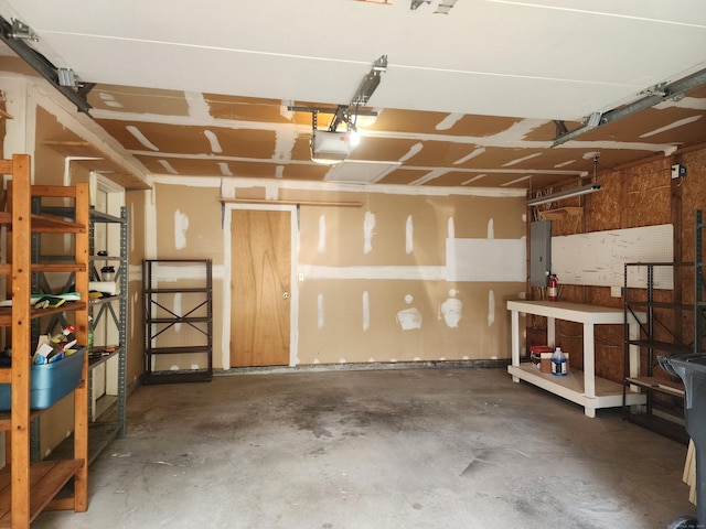 2415 Shepard Ave Apt 30, Hamden, CT 06518 - garage featuring electric panel and a garage door opener