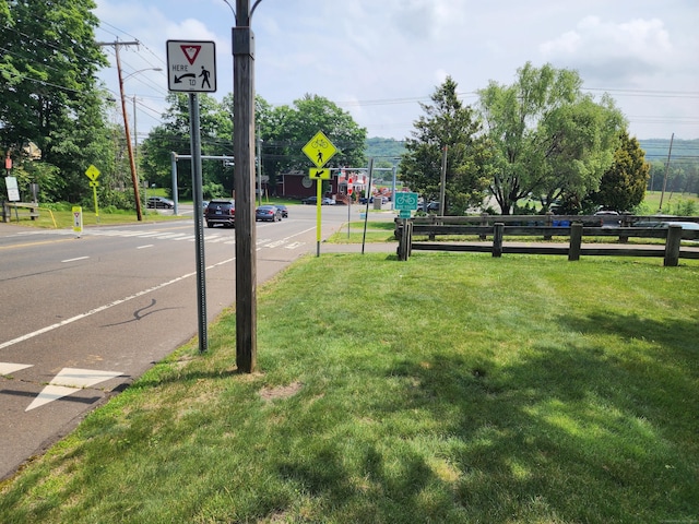 2415 Shepard Ave Apt 30, Hamden, CT 06518 - view of asphalt street featuring traffic signs