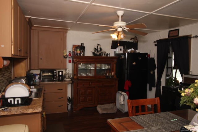 87 Hayden St, Windham, CT 06226 - kitchen with ceiling fan, freestanding refrigerator, and dark wood-type flooring