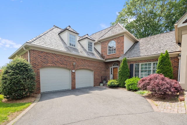 184 Stillson Rd Unit 184, Fairfield, CT 06825 - traditional home with driveway, brick siding, a garage, and a high end roof
