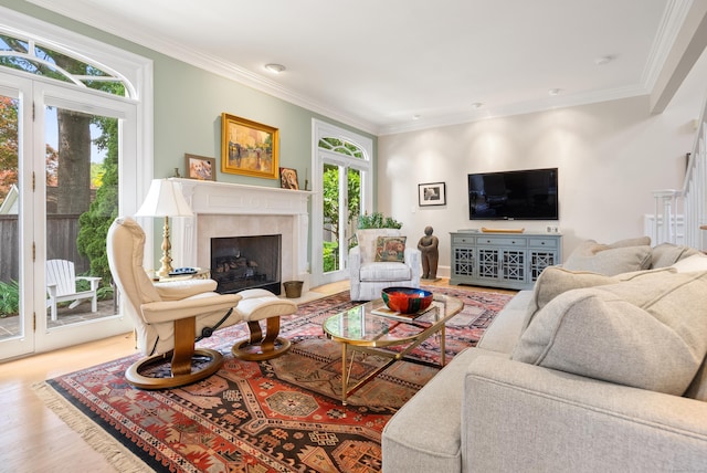 184 Stillson Rd Unit 184, Fairfield, CT 06825 - living area featuring a tile fireplace, wood finished floors, and ornamental molding