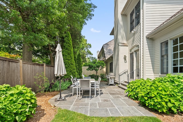 184 Stillson Rd Unit 184, Fairfield, CT 06825 - fenced backyard with a patio area and a grill