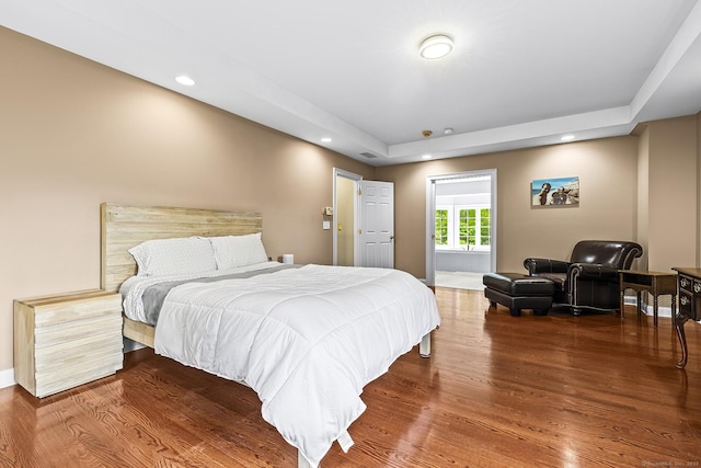 20 Pheasant Ln, Easton, CT 06612 - bedroom featuring wood finished floors, a raised ceiling, and recessed lighting