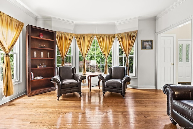20 Pheasant Ln, Easton, CT 06612 - living area with wood finished floors, baseboards, and crown molding