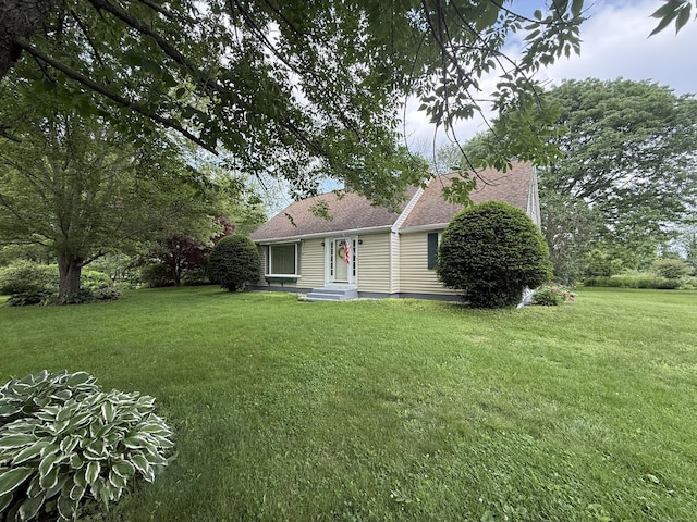 432 Allen Hill Rd, Brooklyn, CT 06234 - rear view of house with a lawn and roof with shingles
