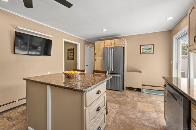 23 Lewis Rd, Preston, CT 06365 - kitchen with stainless steel appliances, light brown cabinetry, a baseboard heating unit, a ceiling fan, and ornamental molding