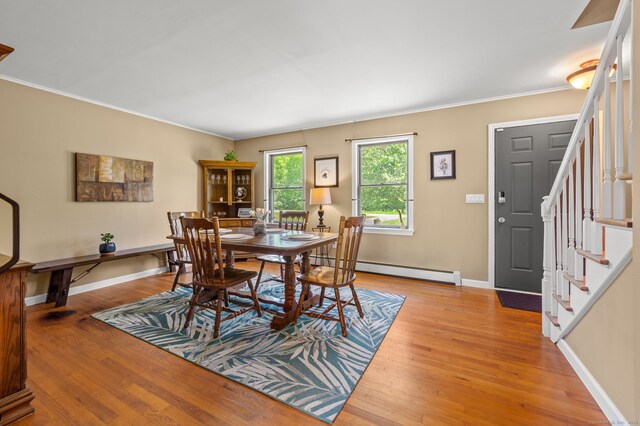 23 Lewis Rd, Preston, CT 06365 - dining area with stairs, light wood finished floors, ornamental molding, a baseboard heating unit, and baseboards