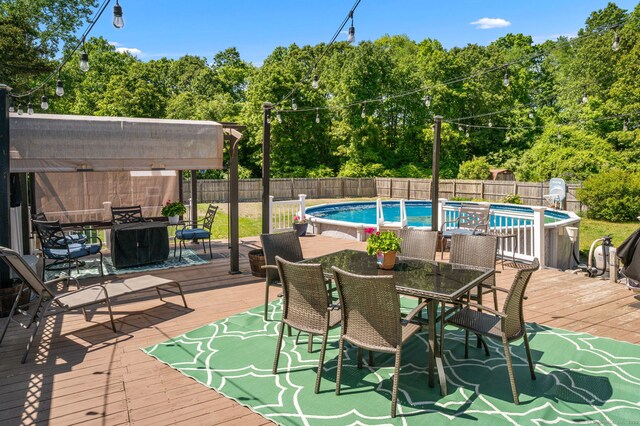 23 Lewis Rd, Preston, CT 06365 - deck featuring outdoor dining area and a fenced backyard