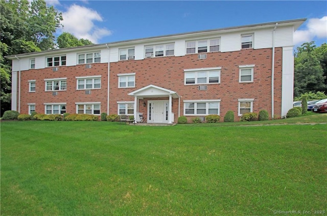 17 Fordyce Ct Apt 13, New Milford, CT 06776 - view of front of property featuring a front lawn and brick siding
