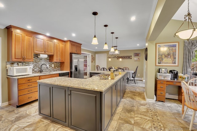 35 Summer St, Portland, CT 06480 - kitchen featuring stainless steel fridge, white microwave, a baseboard heating unit, crown molding, and a spacious island