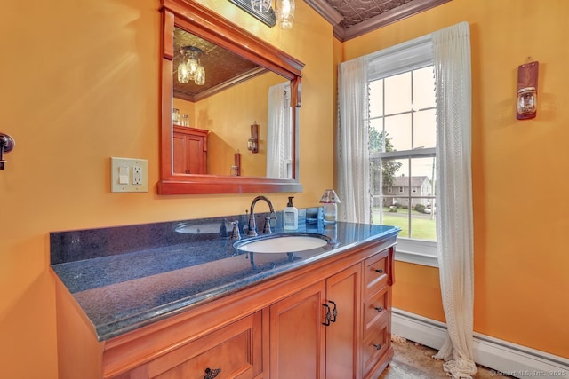 35 Summer St, Portland, CT 06480 - bathroom featuring crown molding, plenty of natural light, a baseboard radiator, and vanity