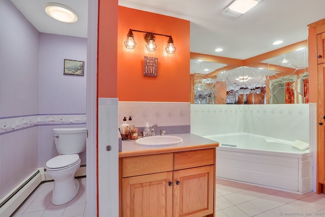 35 Summer St, Portland, CT 06480 - bathroom with a baseboard heating unit, tile patterned floors, a bath, wainscoting, and vanity