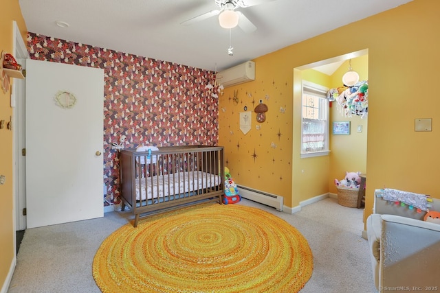 35 Summer St, Portland, CT 06480 - carpeted bedroom with a wall unit AC, a baseboard radiator, a ceiling fan, and a nursery area