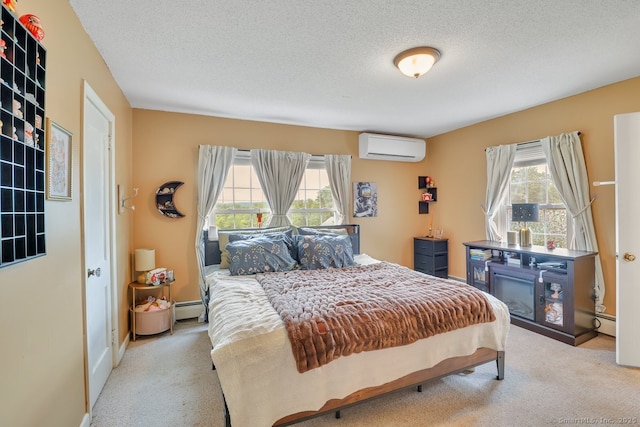 35 Summer St, Portland, CT 06480 - bedroom with a wall mounted air conditioner, carpet floors, a baseboard heating unit, multiple windows, and a textured ceiling