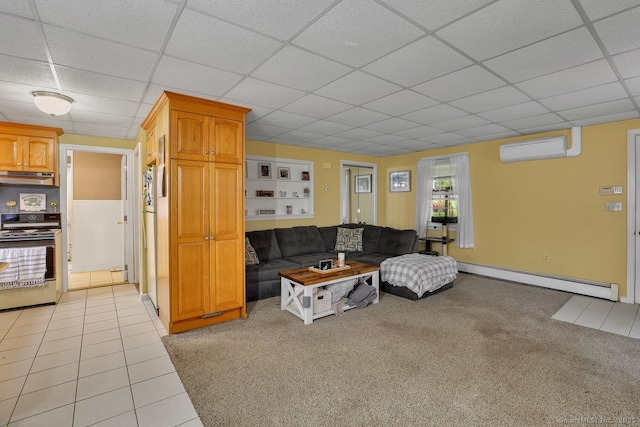 35 Summer St, Portland, CT 06480 - living area with a wall unit AC, baseboard heating, a paneled ceiling, light carpet, and light tile patterned floors