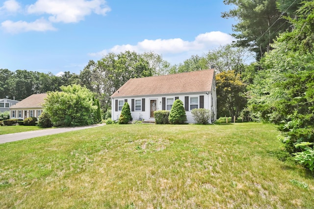 84 Wellman Rd, Manchester, CT 06040 - view of front facade featuring a front lawn and a chimney