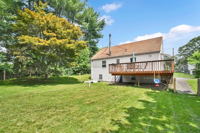84 Wellman Rd, Manchester, CT 06040 - rear view of house featuring a deck, a yard, and a shingled roof