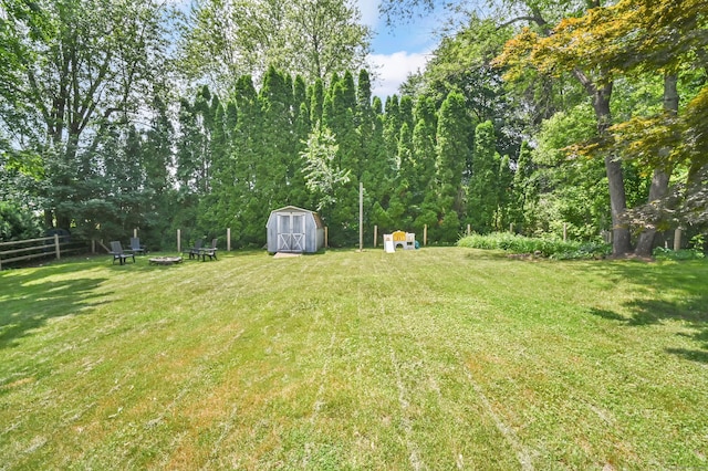 84 Wellman Rd, Manchester, CT 06040 - view of yard with an outdoor fire pit and a shed
