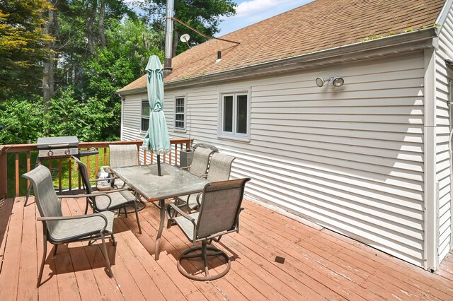 84 Wellman Rd, Manchester, CT 06040 - wooden terrace featuring outdoor dining space and a grill
