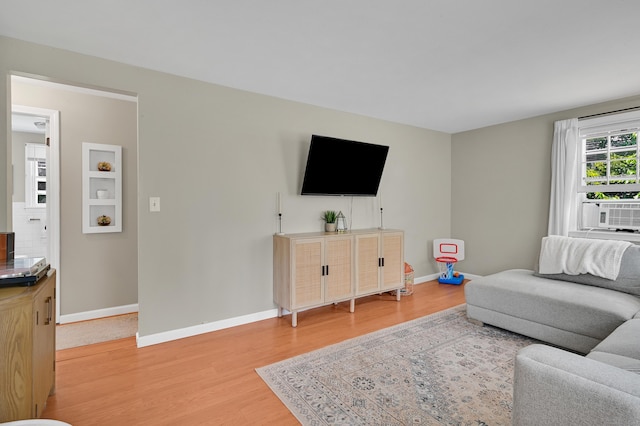 84 Wellman Rd, Manchester, CT 06040 - living room featuring light wood-style flooring and cooling unit