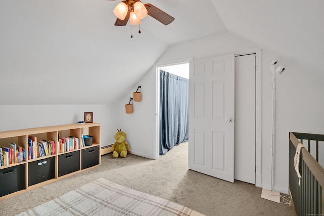 84 Wellman Rd, Manchester, CT 06040 - rec room with lofted ceiling, carpet, ceiling fan, and a baseboard heating unit