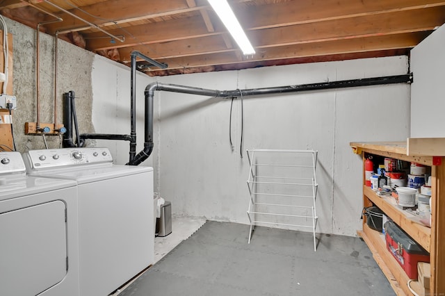 84 Wellman Rd, Manchester, CT 06040 - washroom with washer and clothes dryer and a workshop area