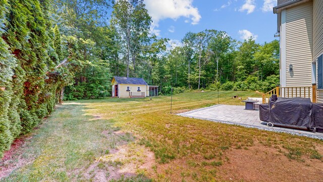 19 Heritage Brook Dr, East Haddam, CT 06423 - view of green lawn featuring a patio and an outbuilding