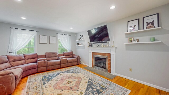 19 Heritage Brook Dr, East Haddam, CT 06423 - living room featuring wood finished floors, a brick fireplace, recessed lighting, and baseboards