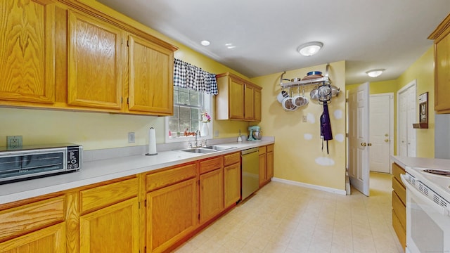 19 Heritage Brook Dr, East Haddam, CT 06423 - kitchen featuring a sink, dishwasher, electric stove, light countertops, and baseboards