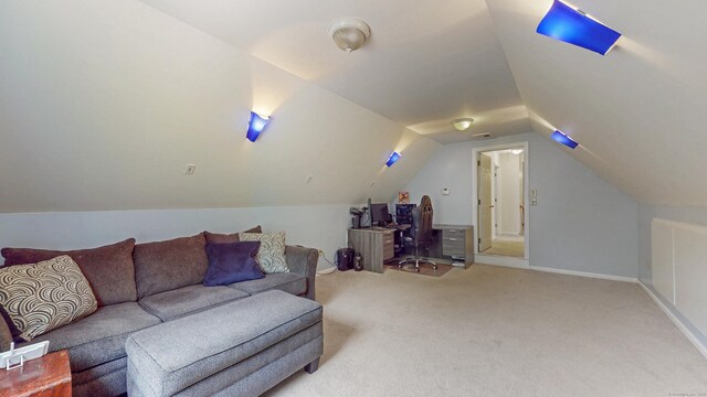 19 Heritage Brook Dr, East Haddam, CT 06423 - living area with light carpet, lofted ceiling, a desk, and baseboards
