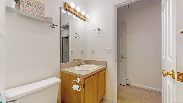 19 Heritage Brook Dr, East Haddam, CT 06423 - half bath with toilet, vanity, and a baseboard heating unit