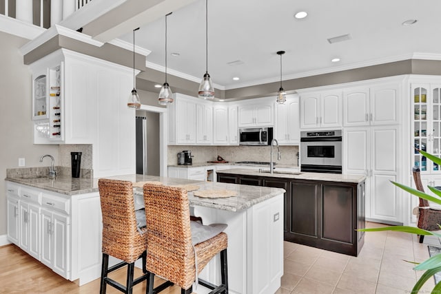 18 Cedar Spring Rd, Burlington, CT 06013 - kitchen featuring appliances with stainless steel finishes, a sink, a peninsula, backsplash, and crown molding