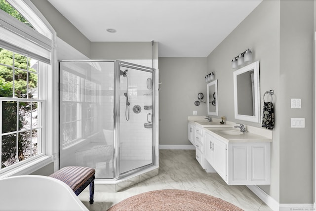 18 Cedar Spring Rd, Burlington, CT 06013 - full bath featuring a freestanding tub, double vanity, a stall shower, baseboards, and marble finish flooring