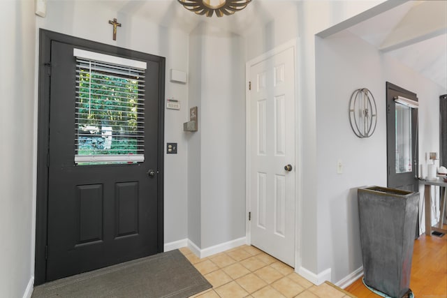 21 Hubbard Rd Apt 1, Wilton, CT 06897 - entryway featuring baseboards and light tile patterned floors