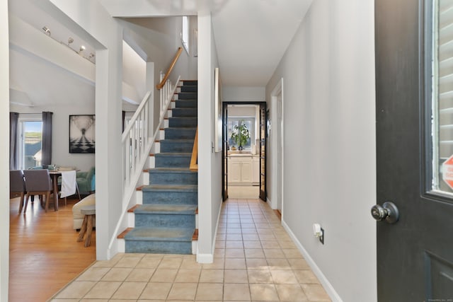 21 Hubbard Rd Apt 1, Wilton, CT 06897 - entrance foyer with stairway and light tile patterned floors