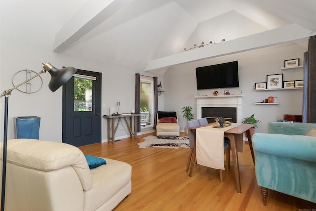 21 Hubbard Rd Apt 1, Wilton, CT 06897 - living room featuring light wood-style floors, a fireplace, and vaulted ceiling
